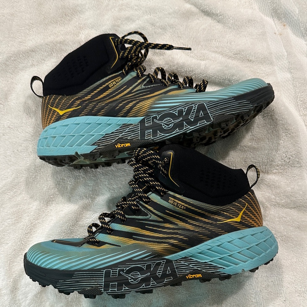 Hoka Blue and Gold Trail Shoes